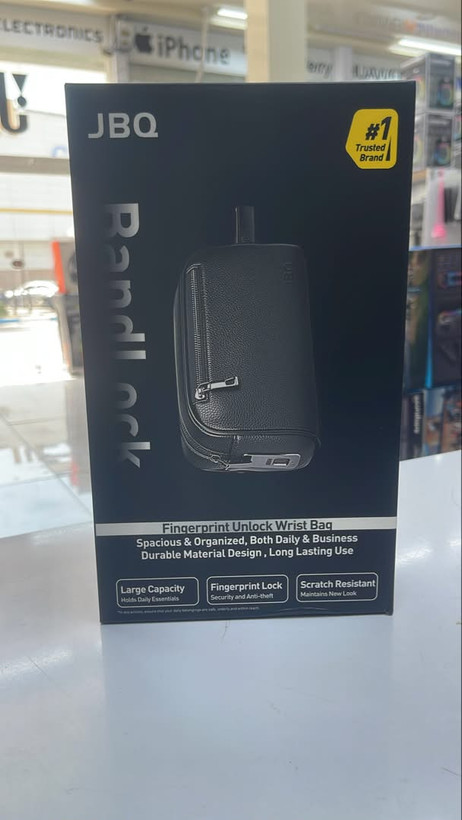 جعبه اورجینال کیف مچی مشکی JBQ مدل Randlock با قفل اثر انگشتی، ظرفیت بالا، طراحی مقاوم در برابر خراش و مناسب استفاده روزمره و اداری